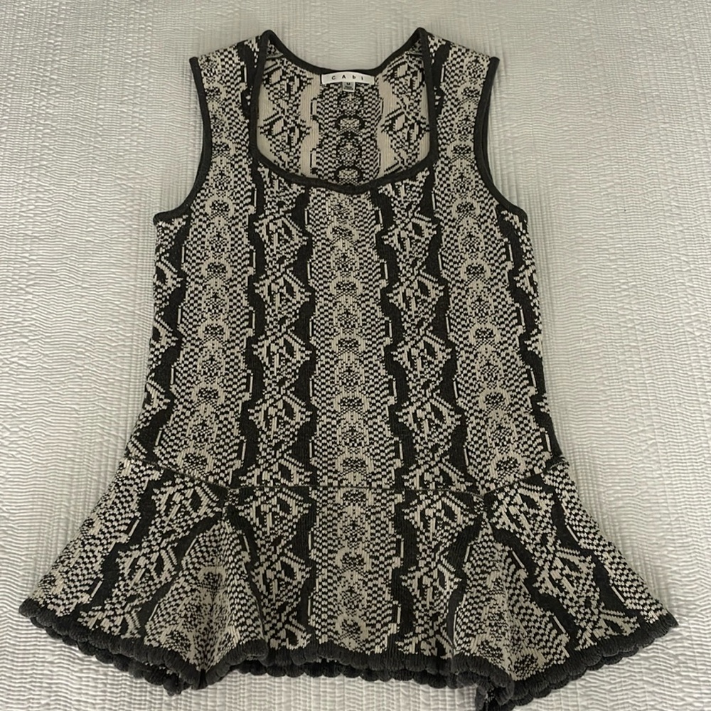 Cabi sleeveless sweater. Adorable peplum bottom.